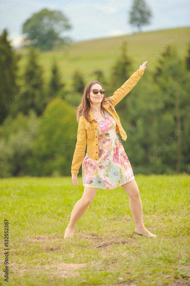 Brunette girl enjoying journey in mountains. Brunette girl enjoying journey in mountains.