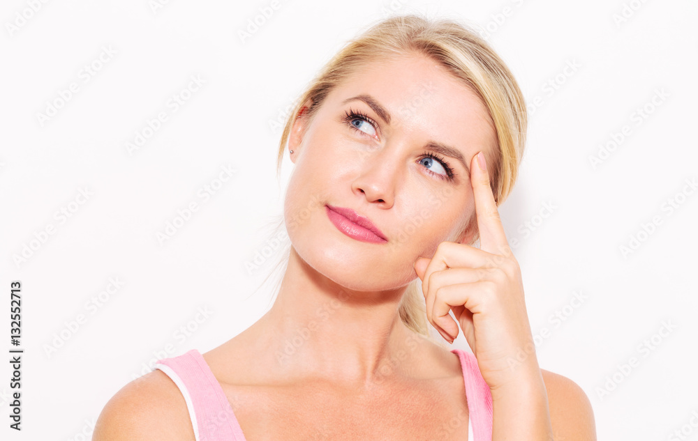 Young woman in a thoughtful pose Young woman in a thoughtful pose