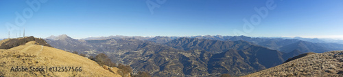 Great landscape with fantastic blue sky on the Orobie Alps and Padana plain a dry winter season without snow. Panorama from Linzone Mountain, Bergamo, Italy. 