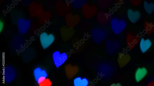 Nong Prajak Public Park Udon Thani, Thailand Heart bokeh. LED flowers colorful illuminated plastic optical fibers in dark back.
 photo