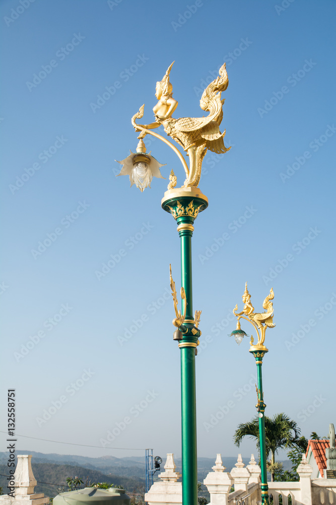 Art lamp in the temple (sky background)