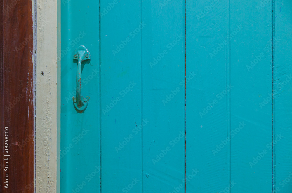 Fototapeta premium Nong Khai, Thailand, Blue wooden door in the room.