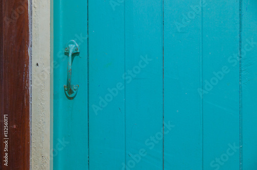 Nong Khai, Thailand, Blue wooden door in the room. © charin