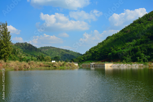 View of mountain forest lake natural landscape with sunny. © surasak