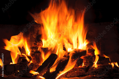 closeup of Flame in a fireplace  flames and burning woods