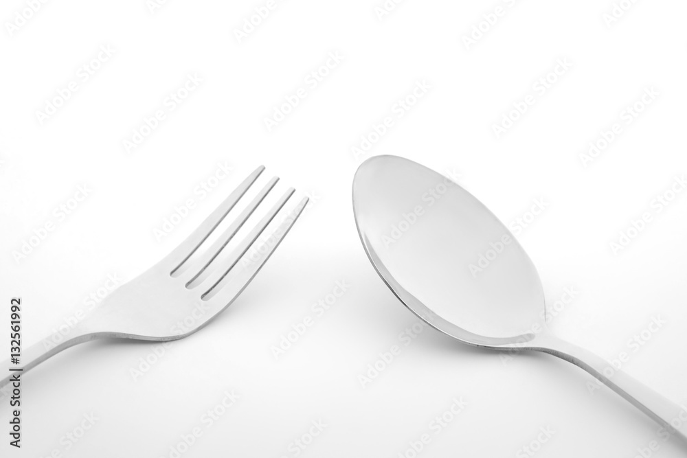 Fork and spoon on white background Fork and spoon on white background