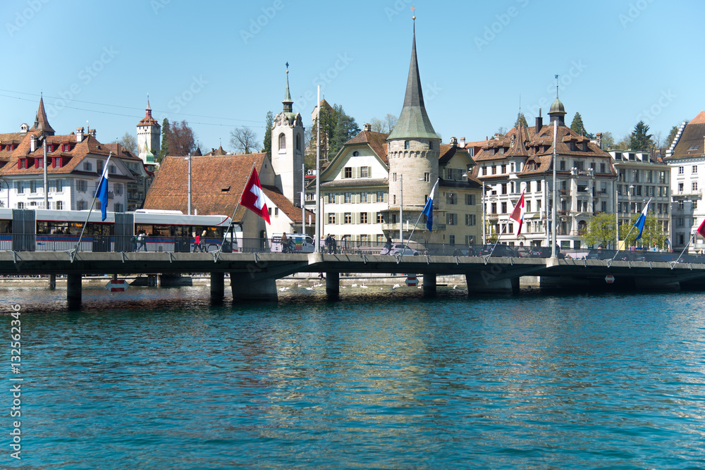 View of Lucerne lake and town with Swiss alps from a ferry, Switzerland - April, 2016