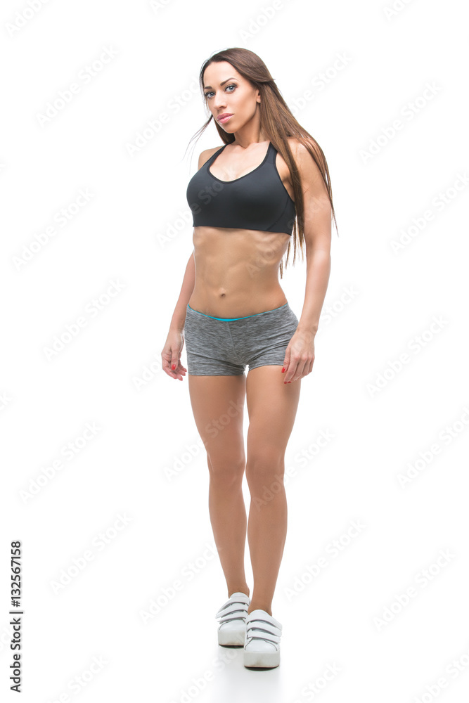 Beautiful fit girl in sport bra and shorts Beautiful fit girl in sport bra and shorts
