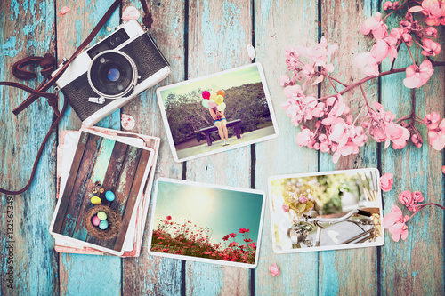 Photo album in remembrance and nostalgia of Happy easter day in spring on wood table. instant photo of vintage camera - vintage and retro style