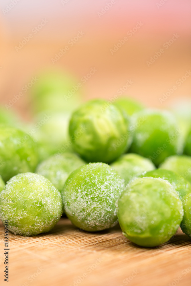 Frozen green peas with blurred background Frozen green peas with blurred background