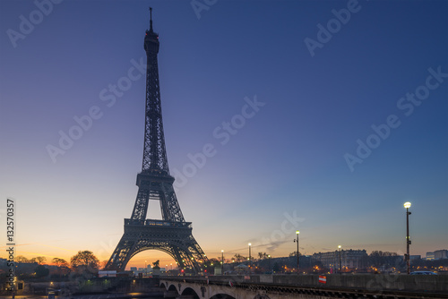 The Eiffel tower at sunrise in Paris