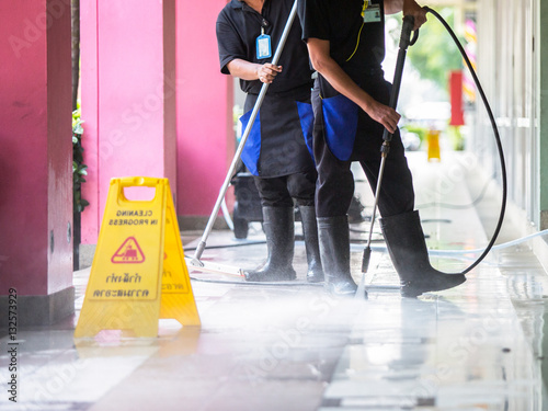 Man cleaning the ground floor

