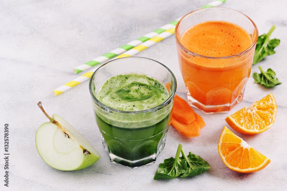 Fototapeta premium Fresh juice from seasonal fruits and vegetables.Healthy eating concept.Selective focus
