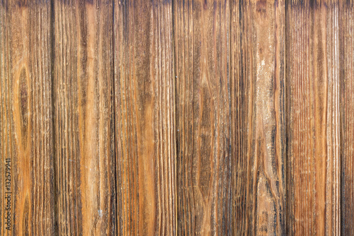 Dark wooden panel texture.