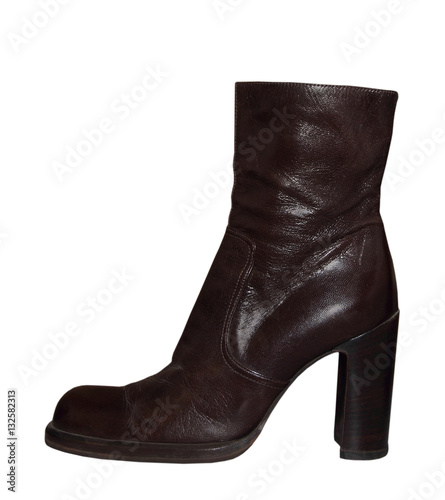 Plakat w ramie Women high-heeled leathers boot isolated on a white.