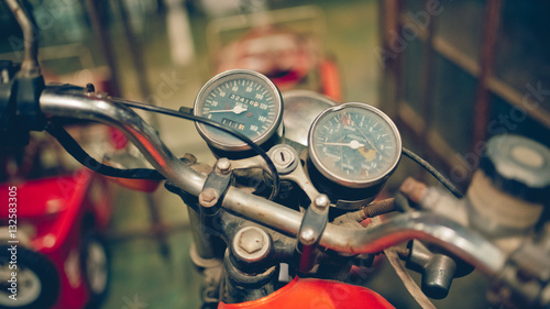 Old rusty grunge Motorcycle speedometer. (vintage style)