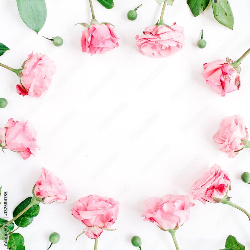 Frame made of pink roses on white background. Flat lay, top view. Valentine's background Frame made of pink roses on white background. Flat lay, top view. Valentine's background
