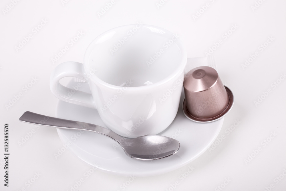 coffee cup with capsule and spoon coffee cup with capsule and spoon