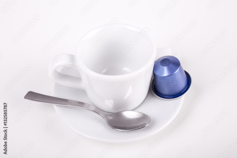 coffee cup with capsule and spoon coffee cup with capsule and spoon