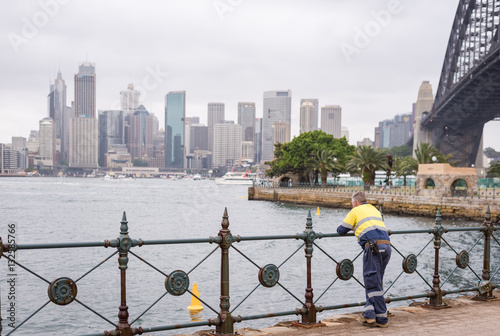 Photography A man enjoy the day beside Sydney Harbour in a cloudy day.