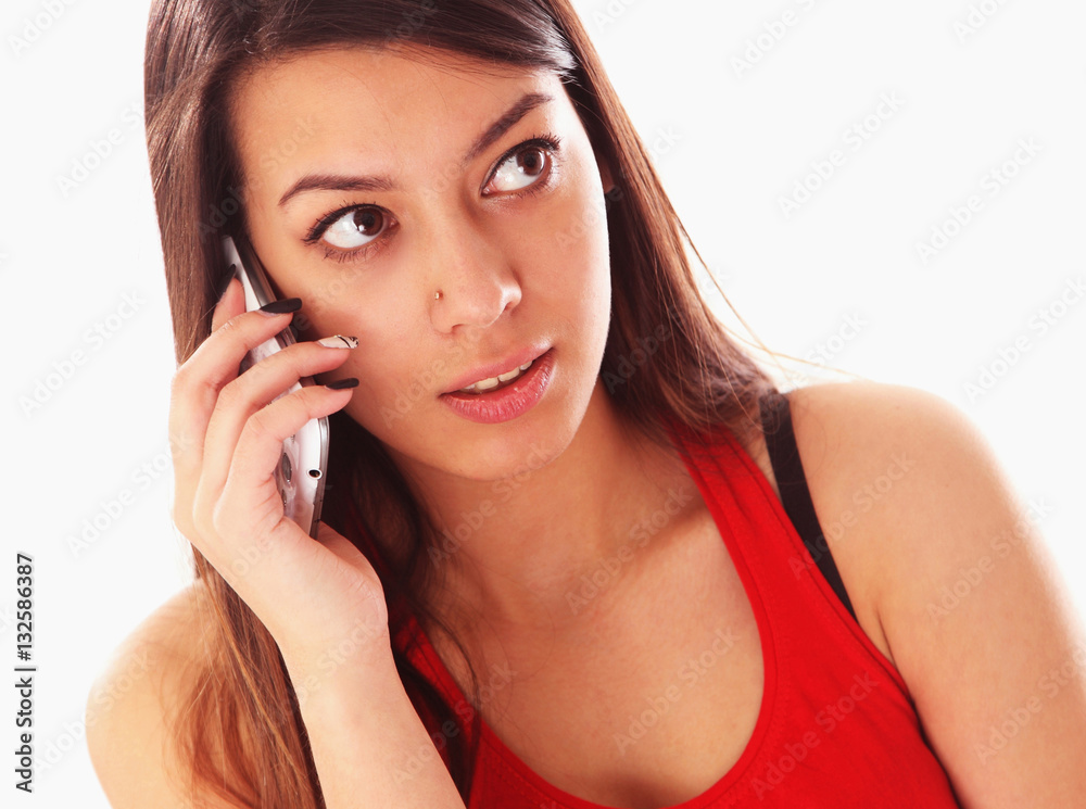 Beautiful young happy woman smiling during a phone call Beautiful young happy woman smiling during a phone call