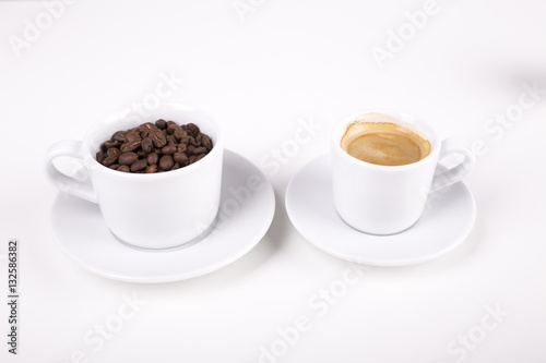 cup of coffe with beans on white background