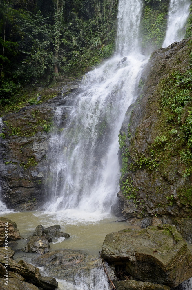 Fototapeta premium Waterfall in deep forest on the mountain.