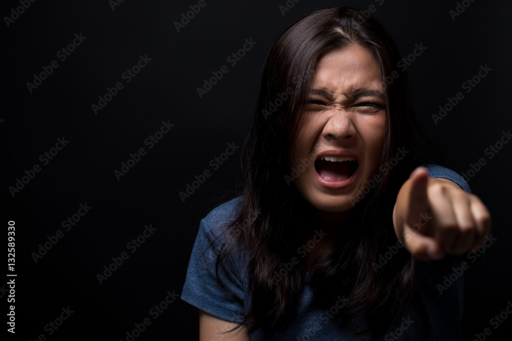 Screaming woman on black background Screaming woman on black background