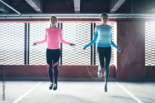 Photography Young sporting women skipping
