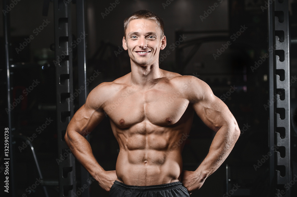 young man train in gym healthcare lifestyle sexy caucasian man. young man train in gym healthcare lifestyle sexy caucasian man.
