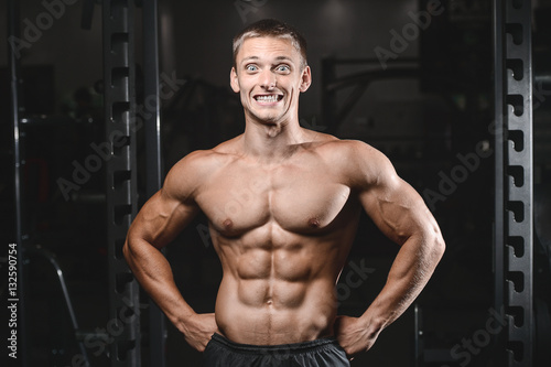 young man train in gym healthcare lifestyle sexy caucasian man. © antondotsenko