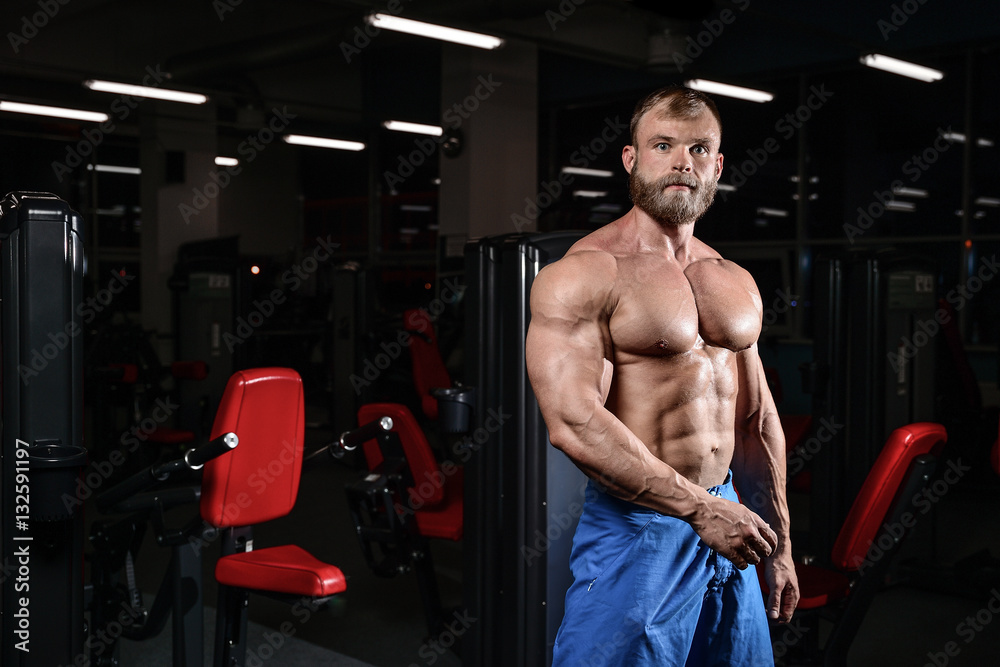 brutal muscular man with beard unshaven fitness model healthcare