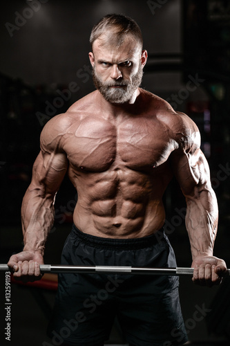 brutal muscular man with beard unshaven fitness model healthcare © antondotsenko