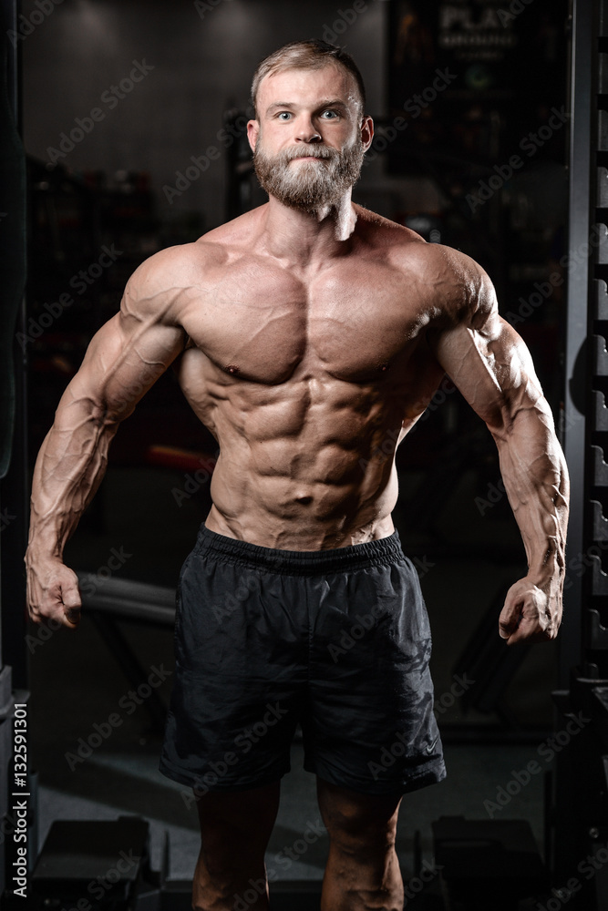 brutal muscular man with beard unshaven fitness model healthcare brutal muscular man with beard unshaven fitness model healthcare