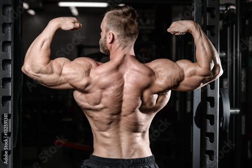 brutal muscular man with beard unshaven fitness model healthcare