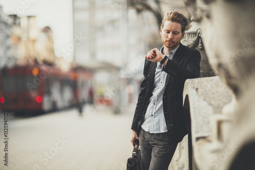 Young businessman on the street © BGStock72