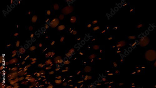 Drifting Sparks on Black Background
