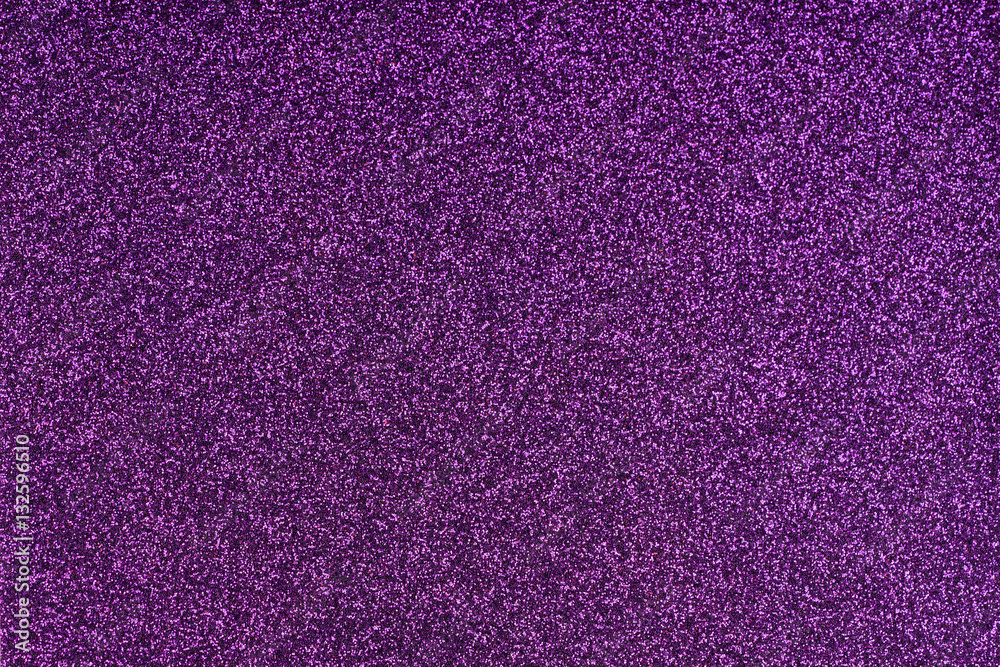 Glittering lilac paper sheet. Violet texture background. Sparkling purple pattern.