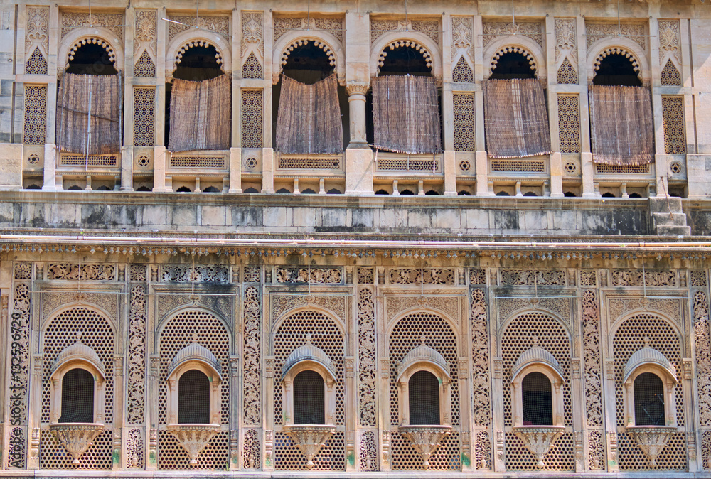 Rows of nineteenth century windows in Gujarat, India 