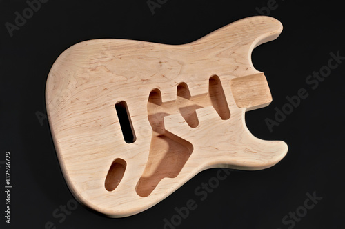 Bare wood or unfinished electric guitar body wood, with blank 