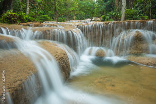 Gao Fu waterfall, the name was given after the name of the landlord and is located in Ngao district of Lampang province, Thailand © phichak