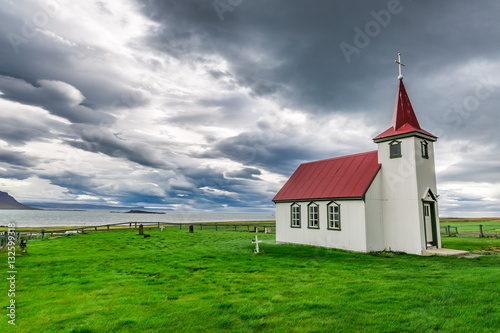 Lonely church on the coast in Iceland in summer