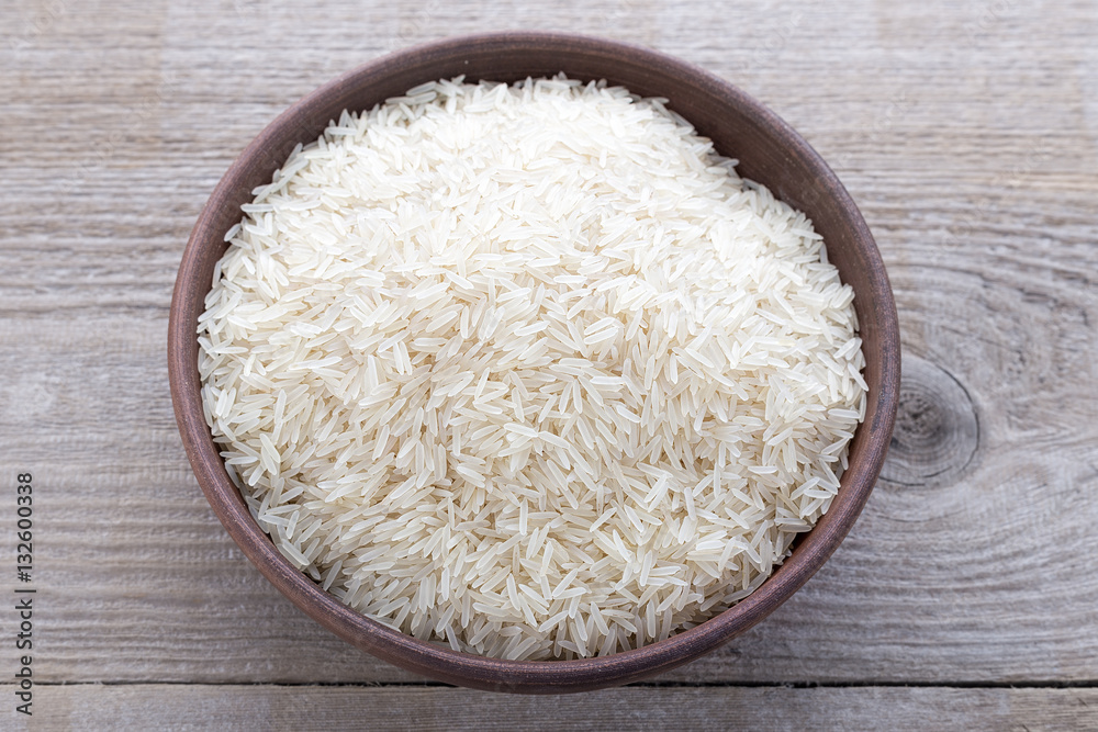 rice on a wooden background rice on a wooden background