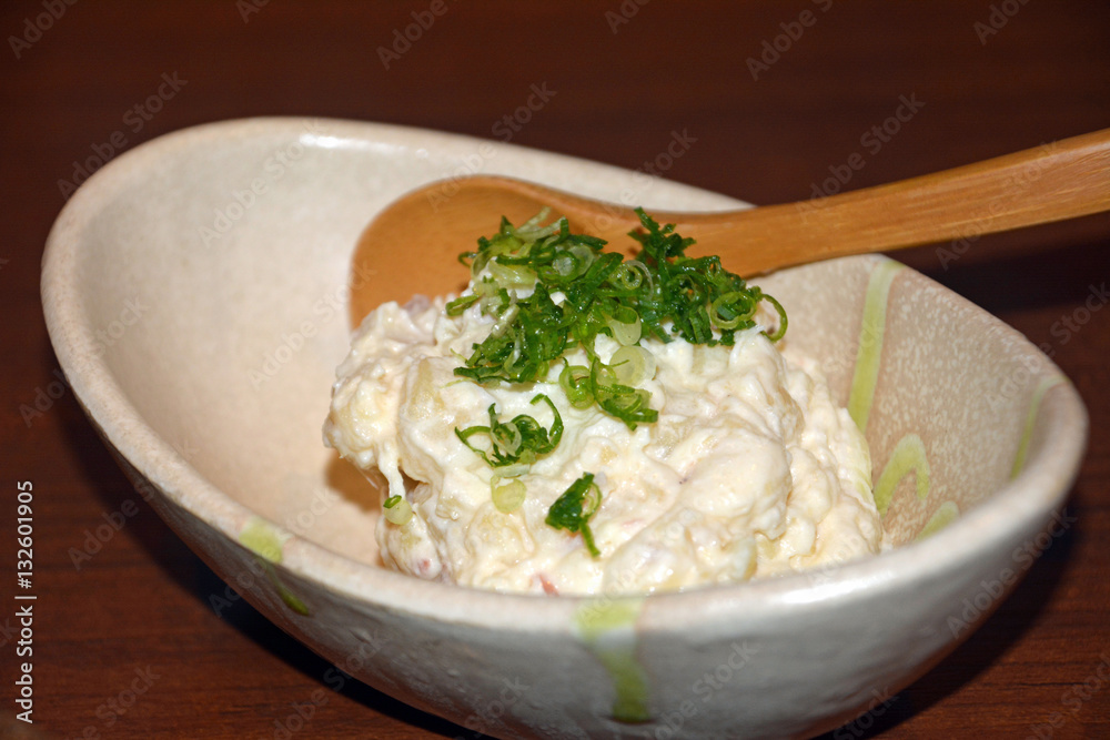 Delicious japanese cuisine, potato salad on a white bowl. Delicious japanese cuisine, potato salad on a white bowl.