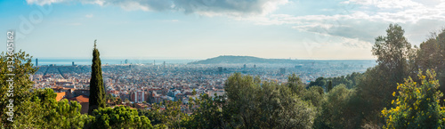 panorama of park guell and barcelona city in the background