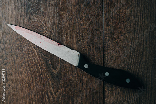 wooden background, knife