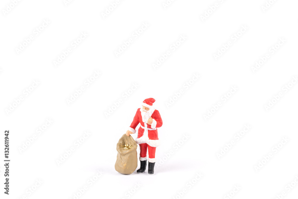 Miniature people Santa Claus on background with space for text