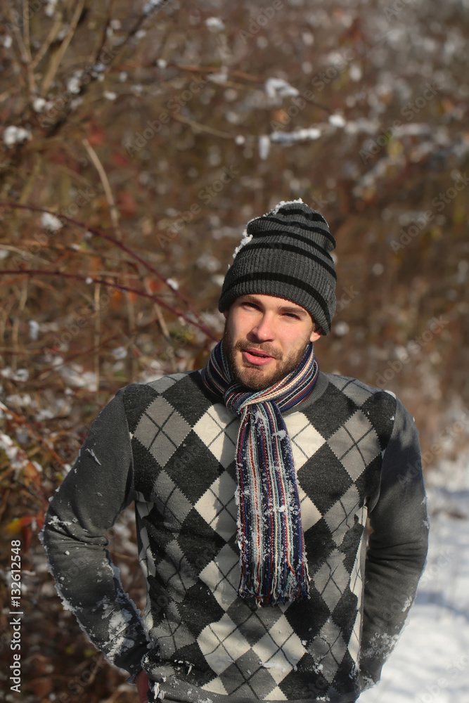 handsome man in winter forest handsome man in winter forest