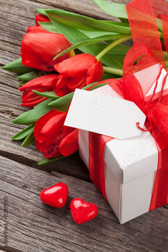 Red tulips and gift box