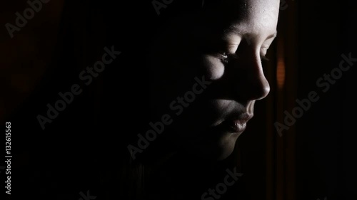 4Scared by something teen girl in the dark. 4K UHD.